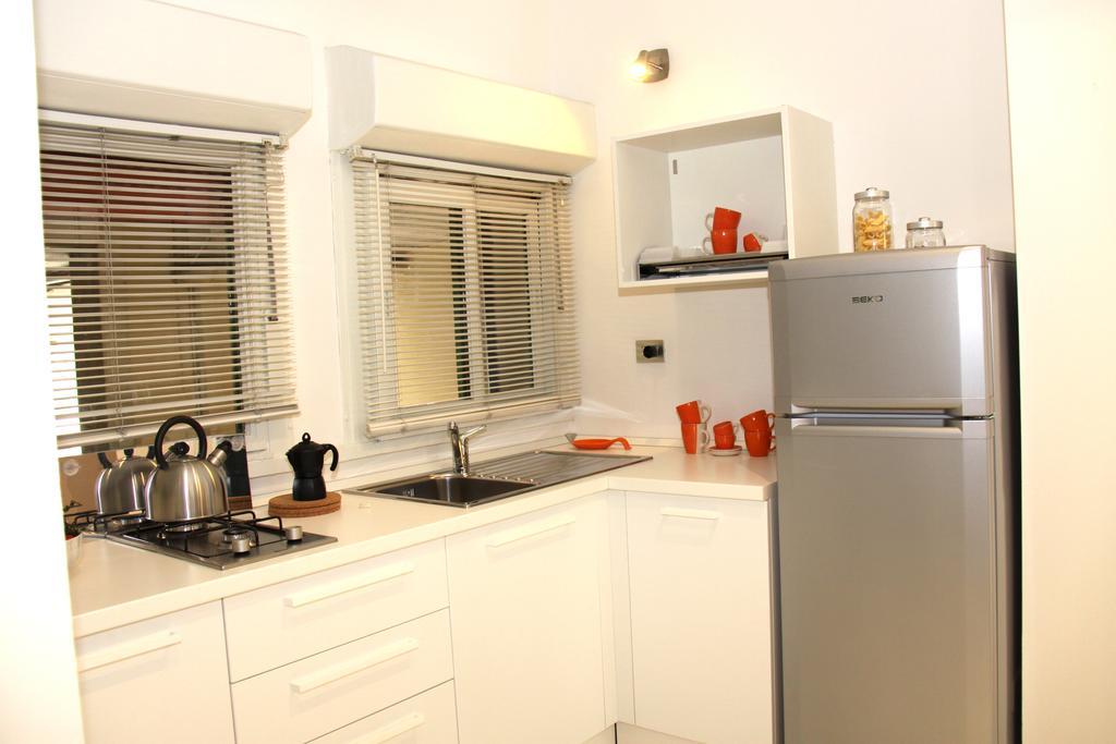 Apartamento Terrazze Fiorite Bérgamo Habitación foto